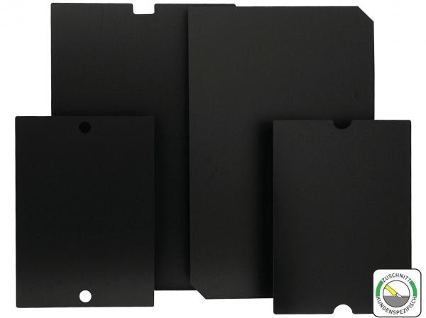 The image shows four black plates of different sizes and shapes, arranged on top of each other. Some have notches on the edges to facilitate handling.
