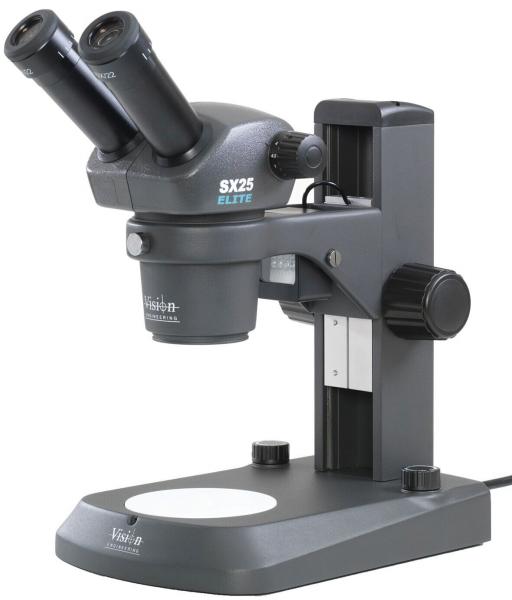 The image shows a microscope with two eyepieces, a stable base, and a round slide. It is gray in color and has several adjustment options for focusing.