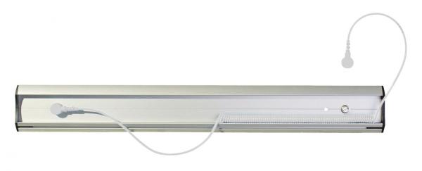 The image shows an elongated, narrow light fixture with a transparent casing. At one end, there is a power cord protruding and a switch. The light fixture has a modern design.