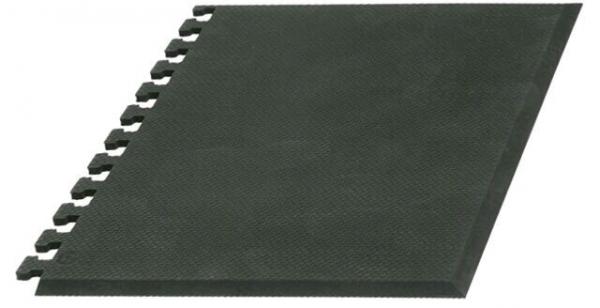 The image displays a rectangular, foam-like mat in dark green. On one side, the corners have jagged connections to join multiple mats together. The surface is slightly textured.