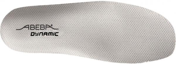 The image displays a bright shoe sole with a textured surface. In the center, the inscription "ABEBA DYNAMIC" is visible in black. The sole has a standard ergonomic shape.
