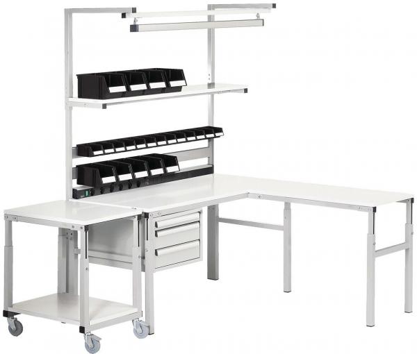 The image shows a modern L-shaped work desk. It has a white tabletop and several shelves. Above are black storage bins, and below are drawers. One side has wheels.