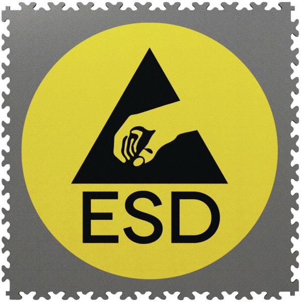 The image displays a yellow, round symbol featuring a black triangle and a hand holding an object. Below it, the letters "ESD" indicate electrostatic discharge.