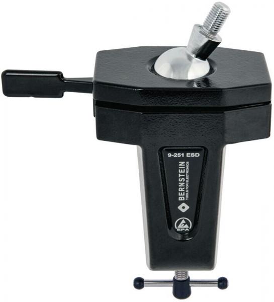 The image shows a black tool. It has a hexagonal shape with a round joint and a lever. Below is a screw used for mounting. Ideal for precise assembly work.
