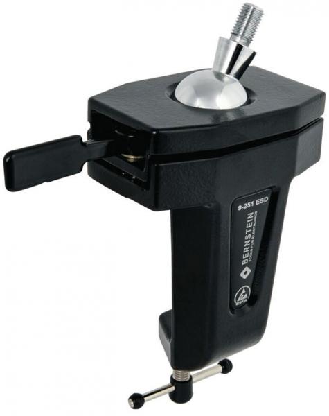 The image shows a black tool holder with a rounded top and a lever on the side. Below there is an adjustable screw for mounting, ideal for precise applications.