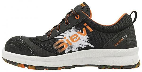 The shoe is black with orange accents and a striking logo. It has a light sole and is sportily designed, suitable for outdoor sports or work.