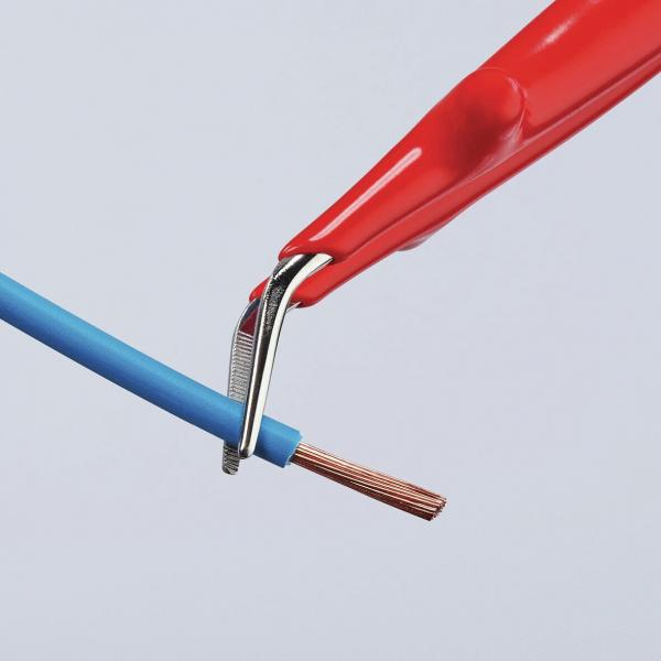The image shows a red pliers positioned near a blue, insulated wire. The wire is partially exposed, revealing copper wires inside.