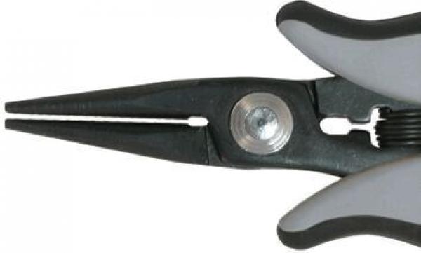 The image shows the tip of a pair of pliers with narrow, pointed jaws. It has a gray plastic handle and a black body. In the center, there is a screw for adjustment.