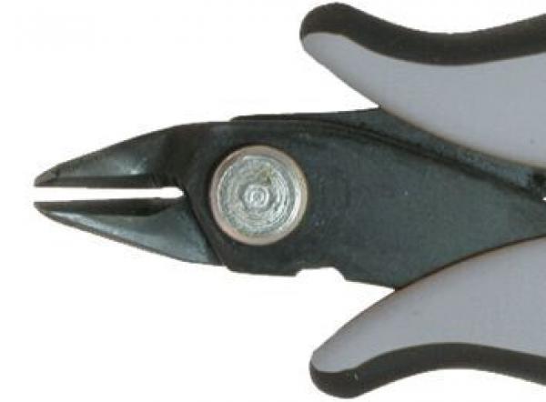 The image shows a part of a pair of pliers. The pliers have black and gray rubber grips and a narrow, pointed cutting edge that is used for cutting or gripping.