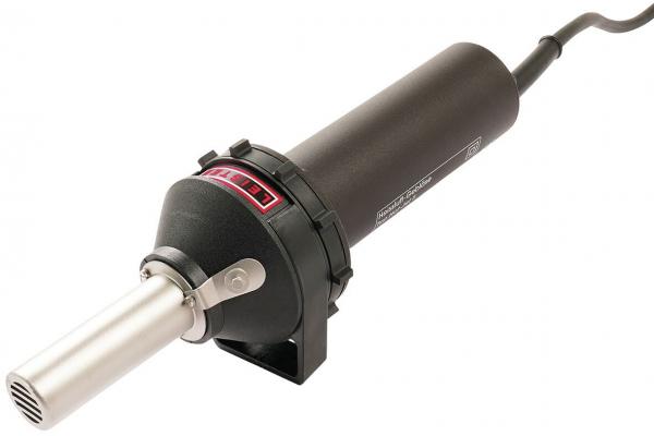 The image shows a hot air gun. It is slim, with a black casing and a long, silver air outlet. On the side, there are controls for temperature regulation.