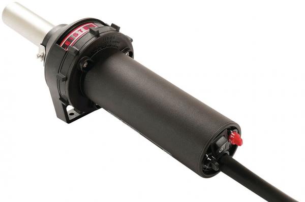 The image shows a black, cylindrical device with a metallic end. It has a switch in shades of red and a connection cable. It appears sturdy and could be part of a technical setup.