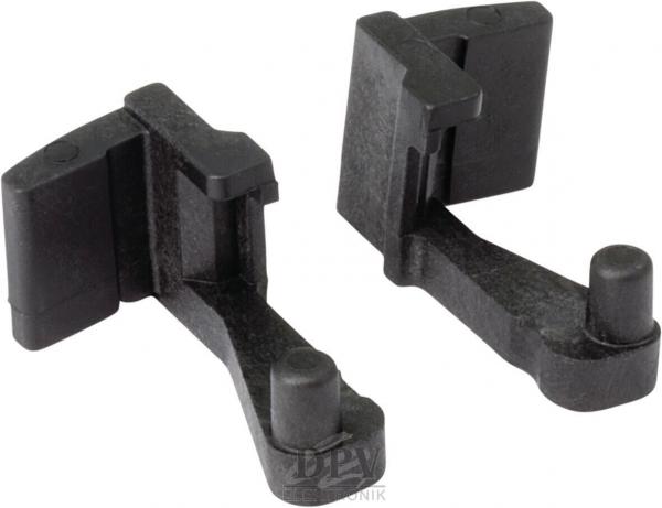 Das Bild zeigt zwei schwarze Kunststoffteile, die symmetrisch geformt sind. Jedes Teil hat eine flache obere Fläche und einen kurzen, geraden Stift. Sie könnten Teil eines Mechanismus oder einer Halterung sein.