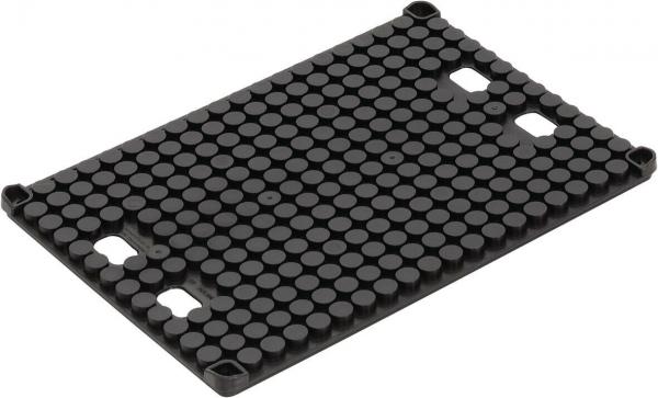 The image shows a rectangular, black plate covered with many small, round protrusions. It has two oval recesses on the sides. The surface is textured and grippy.