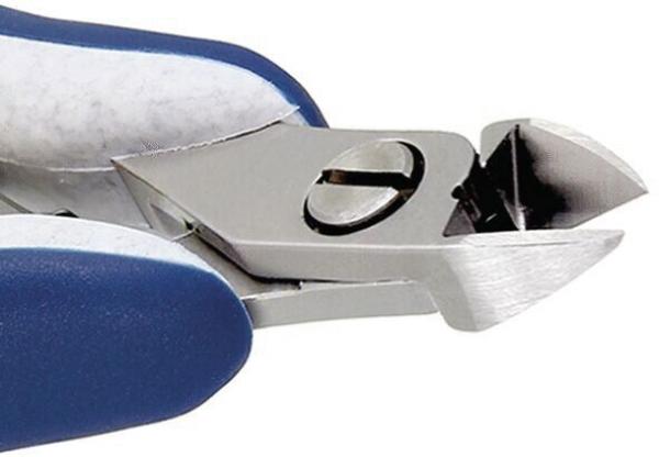 The image shows a nail scissors with a sharp, curved blade and a blue plastic handle. The mechanism allows for precise cutting.