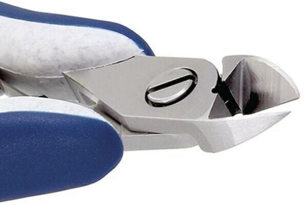 The image shows a nail scissors. The blades are made of shiny metal and slightly curved. The handle has a blue, non-slip surface. The scissors are designed for precise cutting.