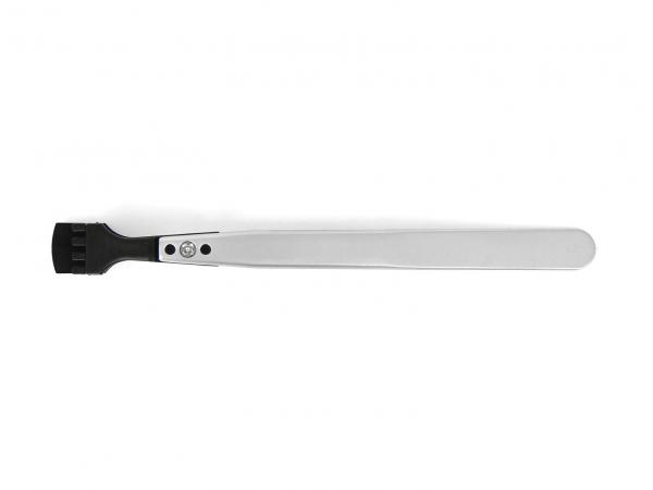 The image shows a long, flat object. At one end, there is a black, serrated part suitable for scraping. The rest is silver-colored and smooth.