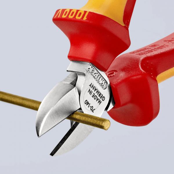 The image shows a red pair of pliers with yellow handles. The cutting edges are open and cutting a thin metal rod. The pliers appear sturdy and handy.
