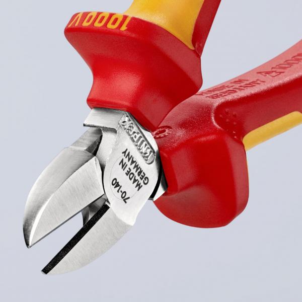 The image shows a red and yellow pliers with sharp, metallic cutting surfaces. The handles are ergonomically shaped and provide a good grip.