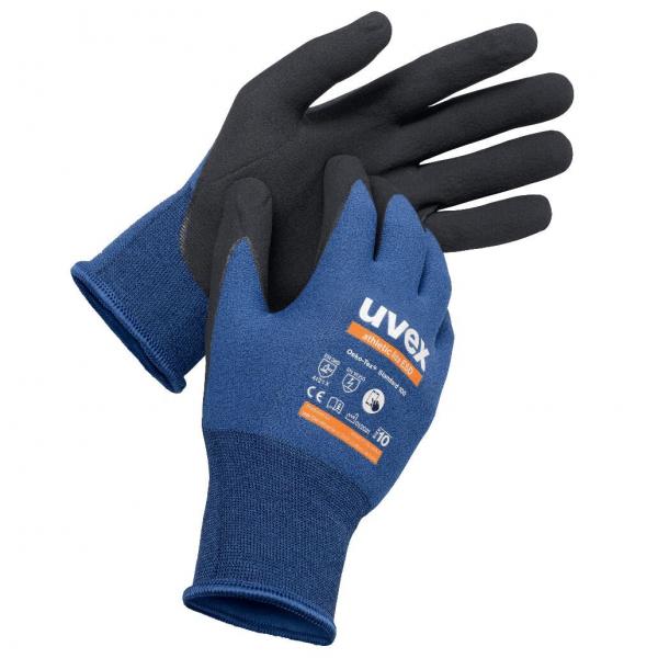 The image shows a pair of gloves. They are blue with a black grip. The gloves have an elastic cuff and a label with orange lettering.
