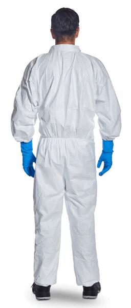 The image shows a person from behind wearing a white protective suit and blue rubber gloves. The suit is loosely fitted, and the person is standing against a neutral background.