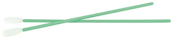 The image shows two straight, green sticks with a white, broad end. They are lying parallel to each other on a light surface. The sticks appear narrow and long.