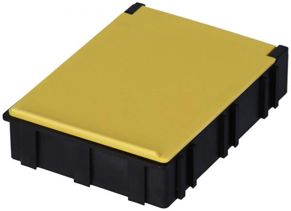 The image displays a rectangular box with a black body and a yellow lid. The top is smooth, while the sides are textured, conveying a sturdy appearance.
