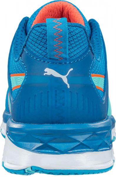 The image shows the rear view of a blue sports shoe. The shoe has a mesh-like upper, orange laces, and a white sole area. On the side is the Puma logo.