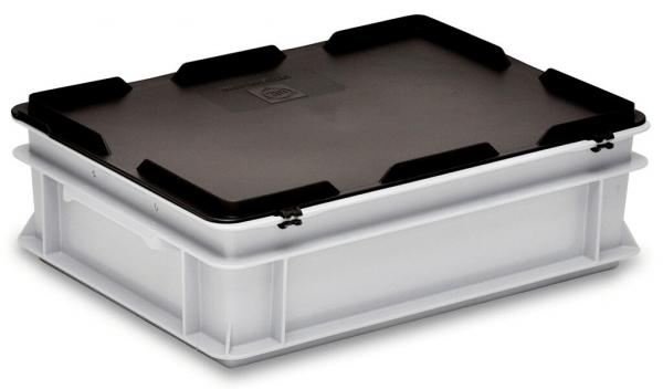The image shows a rectangular plastic storage box. The box is white with a black, removable lid and has side grip openings for easy carrying.