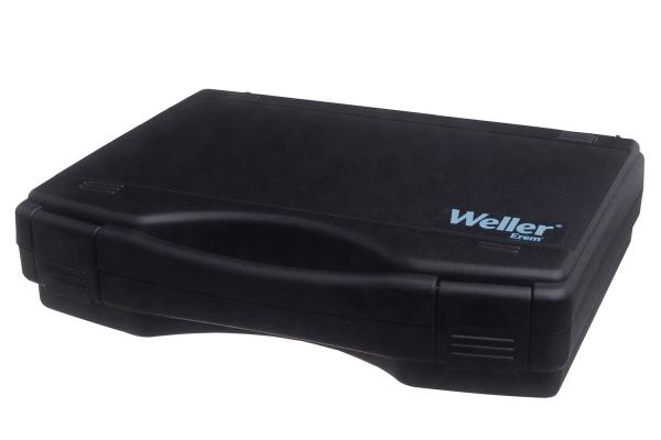 Das Bild zeigt eine schwarze, rechteckige Kunststoffbox mit einer glatten Oberfläche und einem leicht erhabenen Griff. Auf der Oberseite ist das Logo "Weller" in blauer Schrift zu sehen.