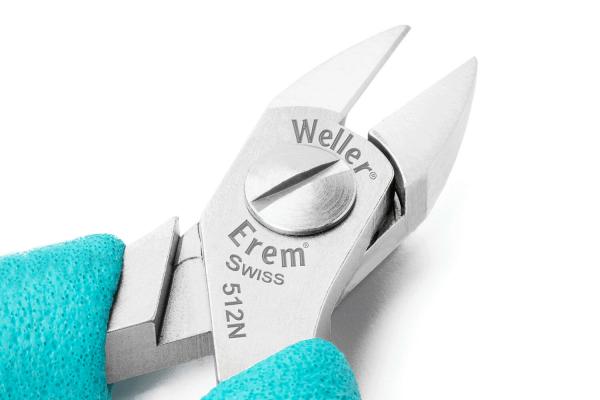 The image shows a pair of pliers with narrow, pointed jaws and an adjustable mechanism. The handle is turquoise, and manufacturer's markings are visible.