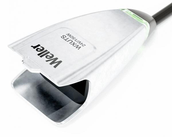 The image shows a silver, shiny device with an open end that looks like a clamp. There is a cable at the neck leading to the right. The inscription "Welat" can be seen on it.