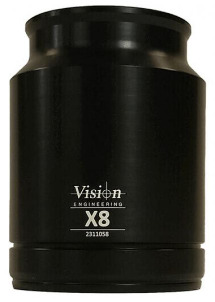 The image shows a black lens attachment with a conical shape. In the center it reads "Vision Engineering" and below that "X8", followed by a number. The upper part is wider than the base.