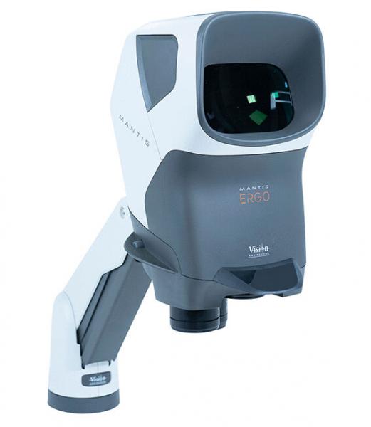 The image shows a modern optical device with a rectangular lens and a swivel mount. It is primarily in white and gray and has an ergonomic shape.
