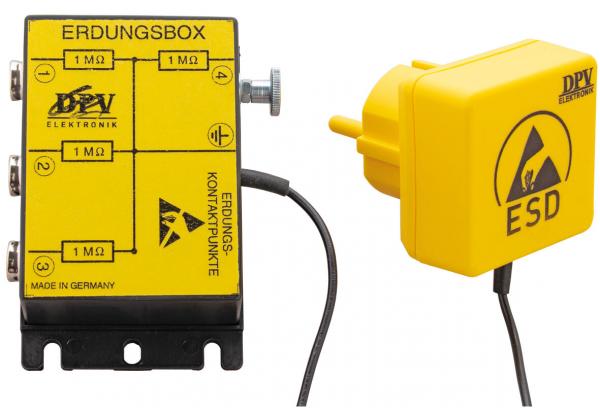 Das Bild zeigt eine gelbe Erdungsbox mit Schaltfeldern und einem Steckdosenadapter. Beide Komponenten sind für die elektrostatische Entladung (ESD) ausgelegt. Die Box hat Schaltkontakte und ist beschriftet.