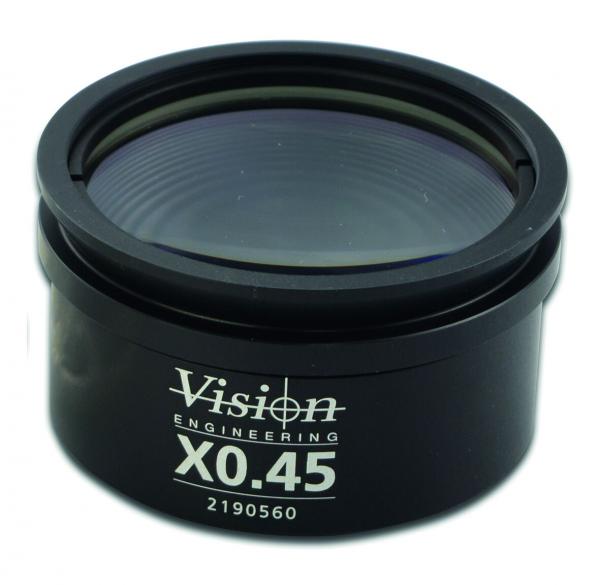 The image shows a round, black lens housing with a glass lens in the center. The housing reads "Vision Engineering X0.45" in white letters. The edge is slightly curved.