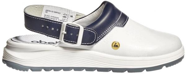 The image shows a white clog with a dark blue strap and a buckle. The sole is thick and provides good grip. A small yellow logo is also visible.