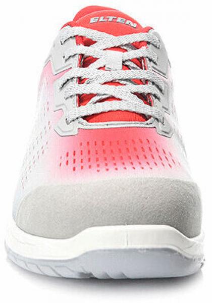 The image displays an athletic shoe. It is primarily gray with a red-white upper. The laces are gray, and the shoe features a cushioning, white sole.