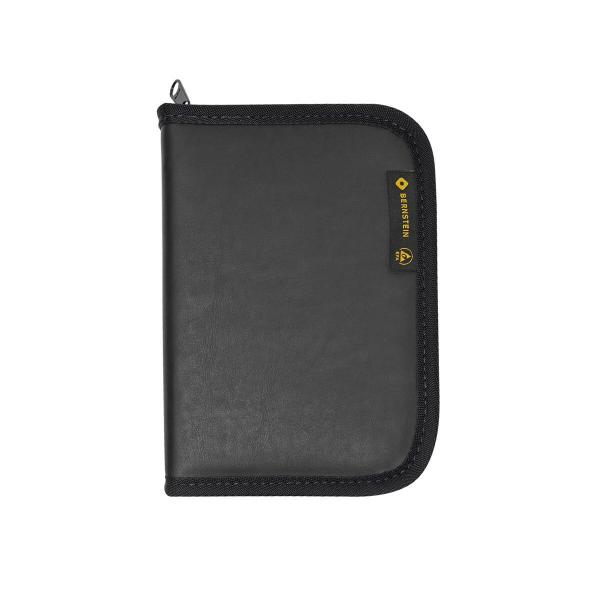 The image shows a black, rectangular wallet or case with a zipper. The surface is smooth, and there is a small yellow logo on the front.