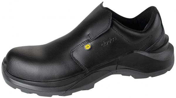 The image shows a black safety shoe without laces. It has a smooth leather surface, an ergonomic shape, and a slip-resistant, thick rubber sole.
