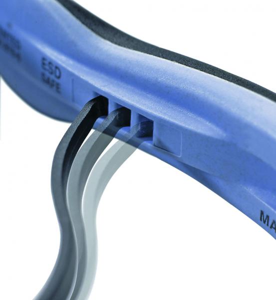 The image displays a blue rubber protector with several cables running through openings. The background is bright, and the focus is on the structure and details of the protector.