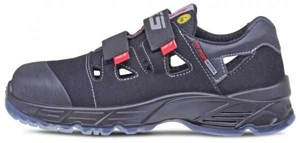 The image shows a black safety shoe with Velcro fastenings. It has a sturdy design, side ventilation slots, and a conspicuous, non-slip sole.