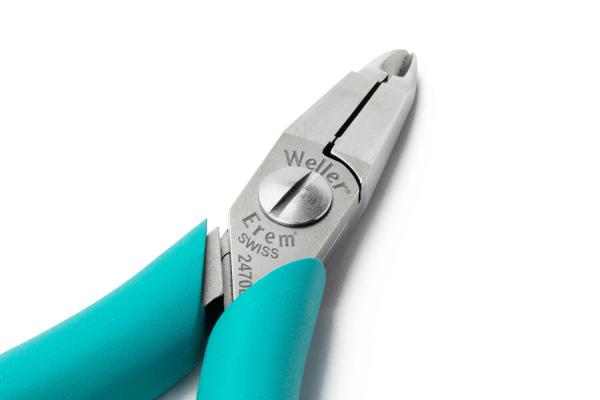 The image shows a pair of pliers with a silver metal tip and turquoise handles. The pliers have a closed cheek that tapers slightly to a point at the tip.