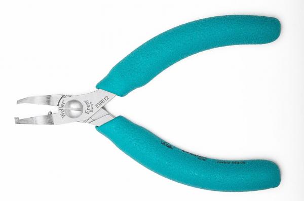 The image shows a pair of pliers with a metallic tip and ergonomic, turquoise handles. The pliers have a slim shape and are often used for precise gripping or cutting.