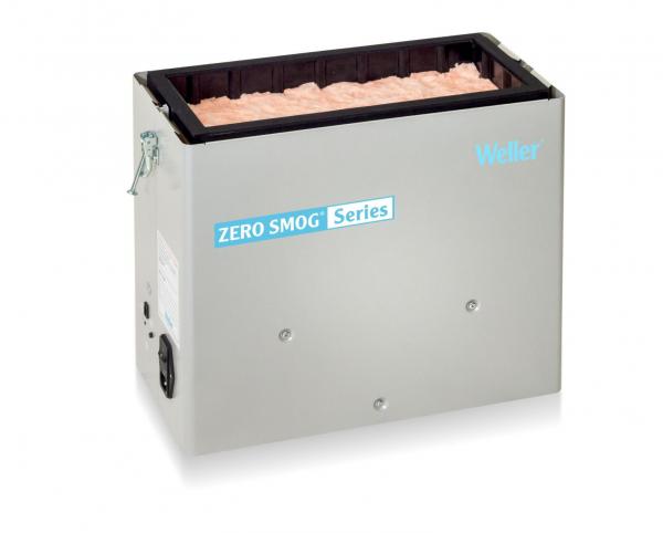 The image shows a rectangular, silver casing with a black lid. On the front is the inscription "ZERO SHOCK Series". The top has a padded surface visible.