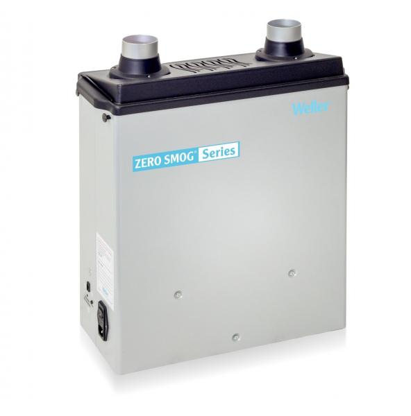 The image shows a rectangular, silver-colored device with two round outlet openings on top. It has a black top with the inscription "ZERO SMOG Series". The front includes a socket.