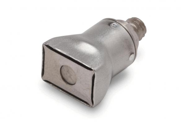 The image shows a small, rectangular metal object with a smooth surface and a round indentation on one side. It appears to be part of a technical device.