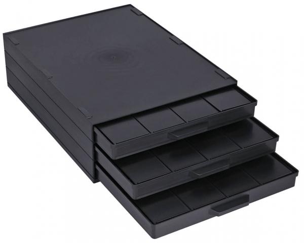 Das Bild zeigt eine schwarze Aufbewahrungsbox mit mehreren Schubladen. Es gibt drei Schubladen, die teilweise herausgezogen sind, und die Oberfläche ist glatt und rechteckig.