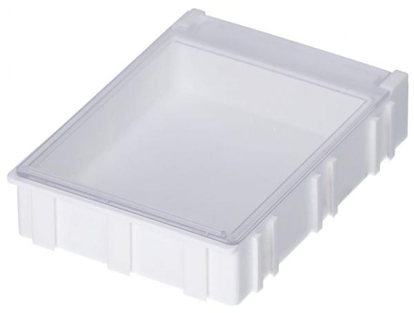 Das Bild zeigt eine flache, rechteckige und transparente Kunststoffbox mit einem geschlossenen Deckel. Die Wände sind strukturiert, und die Box hat eine praktische Form für Aufbewahrung.