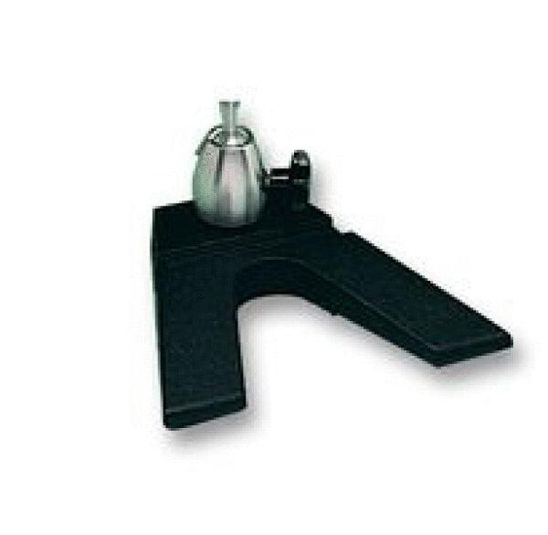 The image shows a black, U-shaped bracket with a metal pot on top. The bracket has a flat, stable base and allows for safe parking of the pot.