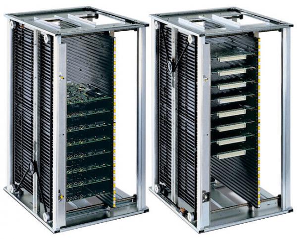 The image shows two identical, open cases for electronic components. They are made of silver metal and have several vertical slots for components that are well ventilated.